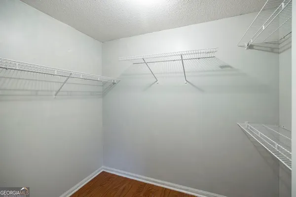 a view of a room with racks on the wall