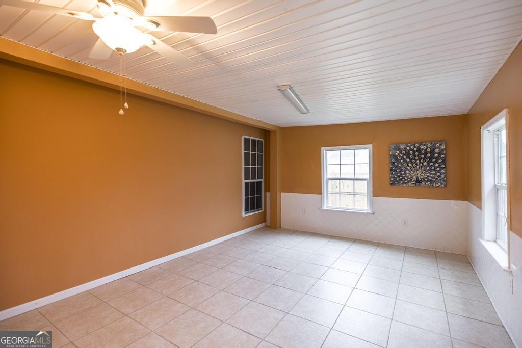 319 Smithville Church Road Warner Robins, GA 31088 - Photo 29 of 34 a view of an empty room with a window