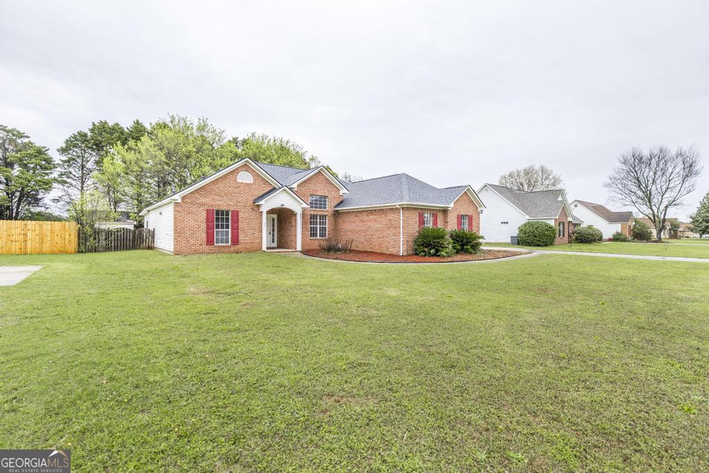 319 Smithville Church Road Warner Robins, GA 31088 - Photo 3 of 34 a house view with garden space