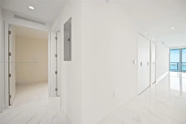 a swimming pool with outdoor seating and yard