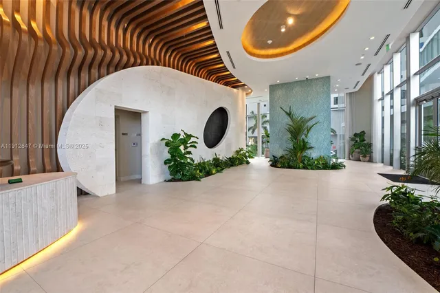 a view of outdoor space with seating area and palm tree