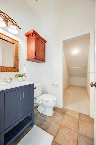 a livingroom with furniture wooden floor and a large window