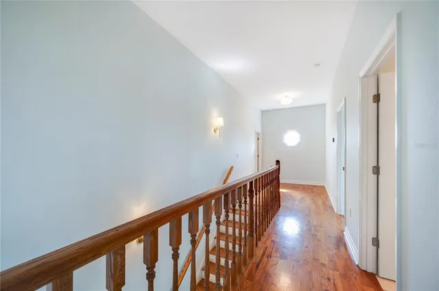 a spacious bedroom with a large bed and a couch