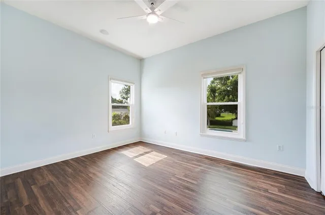 a view of a hallway with seating area