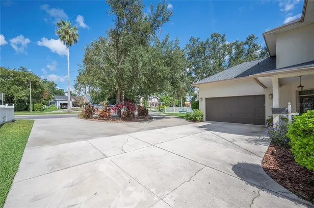 a view of street with parked cars