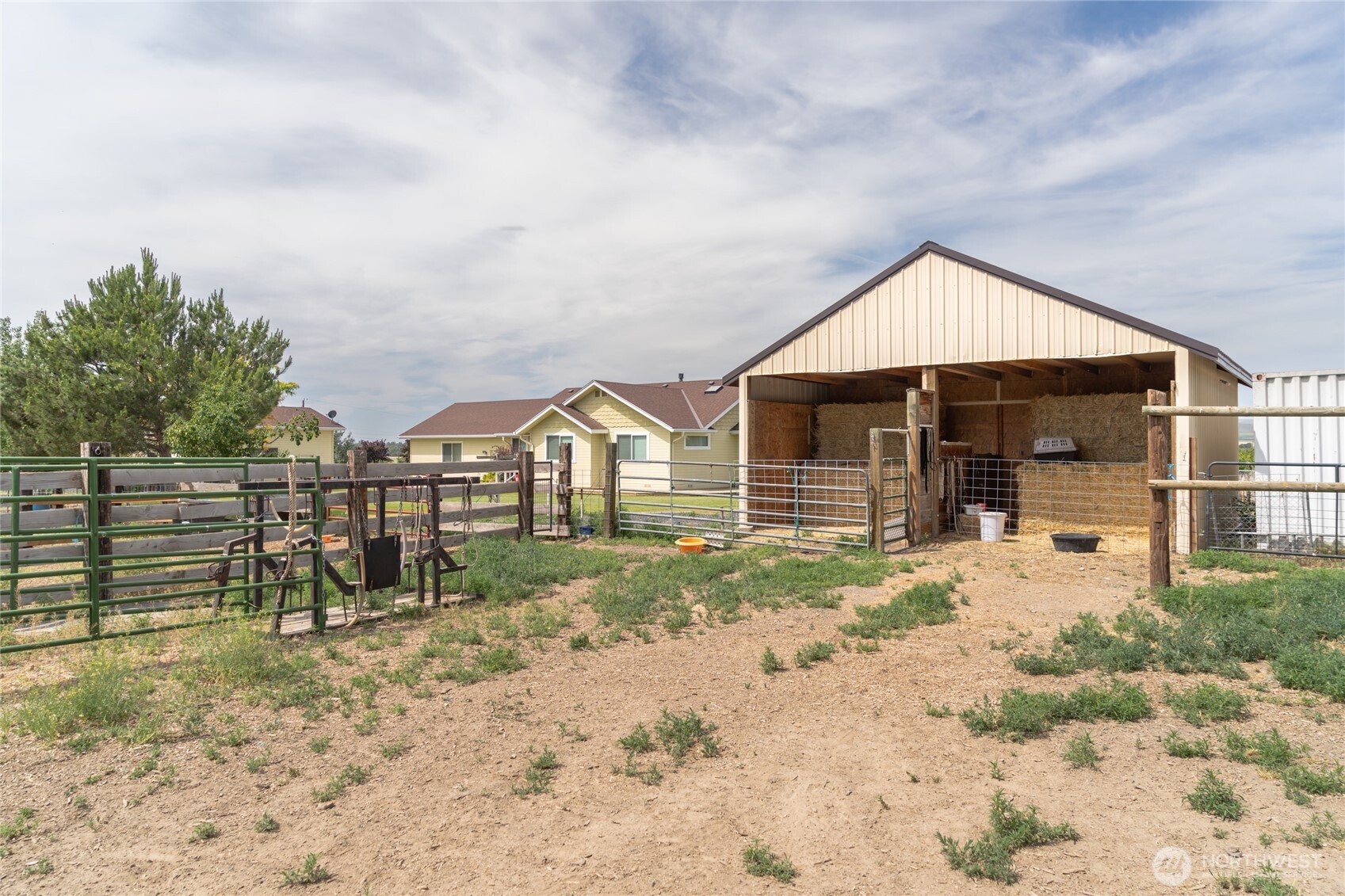 19627 Rd A Northeast Soap Lake, WA 98851 - Photo 11 of 38 a view of a house with wooden fence