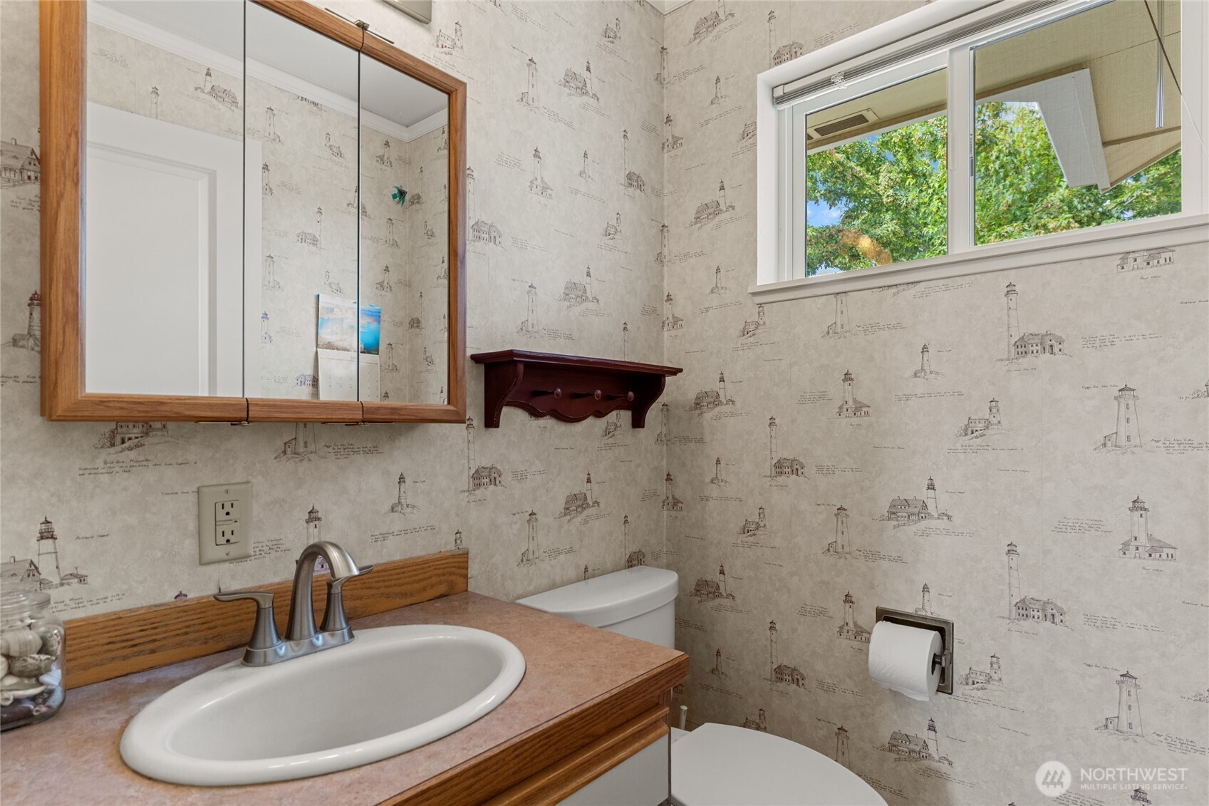 19627 Rd A Northeast Soap Lake, WA 98851 - Photo 21 of 38 a bathroom with a sink a toilet and a mirror