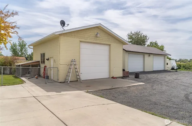 a front view of house with garage