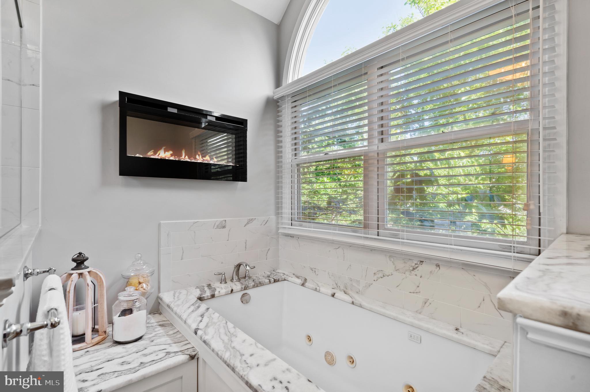 75 Bittersweet Drive Doylestown, PA 18901 - Photo 34 of 65 a bathroom with a bathtub and a window
