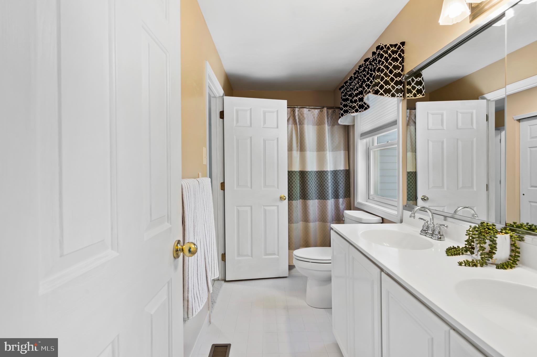 75 Bittersweet Drive Doylestown, PA 18901 - Photo 42 of 65 a bathroom with a sink a toilet and shower