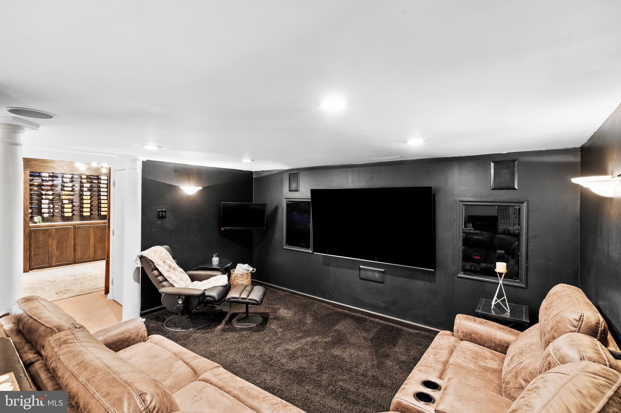 75 Bittersweet Drive Doylestown, PA 18901 - Photo 46 of 65 a living room with furniture and a flat screen tv