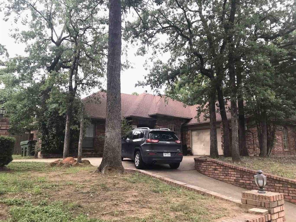 4904 Saddleback Road Arlington, TX 76017 - Photo 2 of 8 a view of a car parked in front of a house