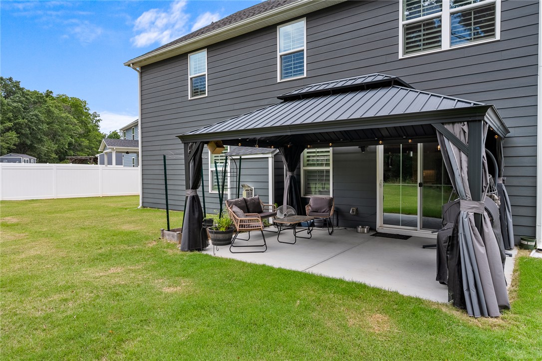 216 Bronson Ridge Anderson, SC 29621 - Photo 38 of 45 A private backyard oasis features a shaded patio, perfect for relaxing or entertaining. Pergola will convey with home.