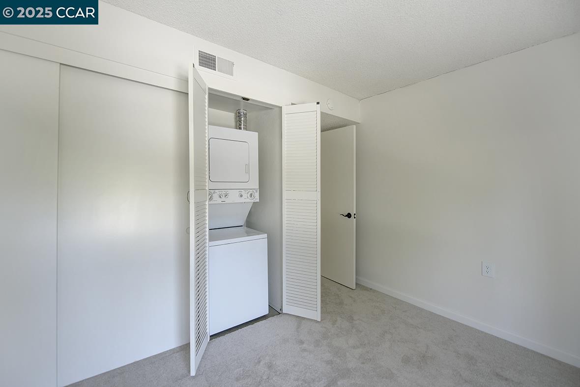 1333 Singingwood Court, Unit 1 Walnut Creek, CA 94595 - Photo 17 of 34 a view of closet area