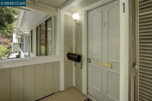 a bathroom with a shower and a mirror