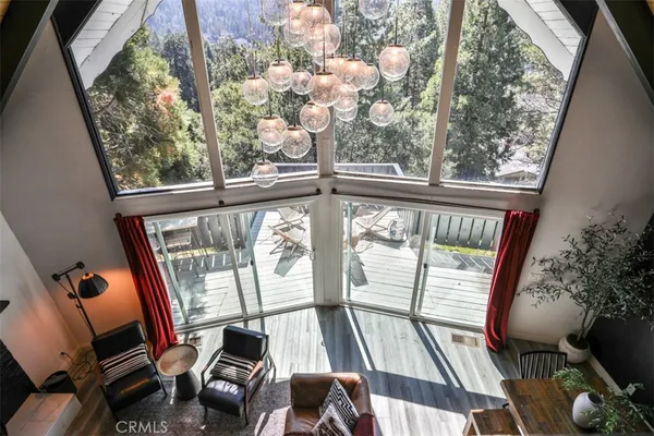 a view of a balcony with a chair and the porch