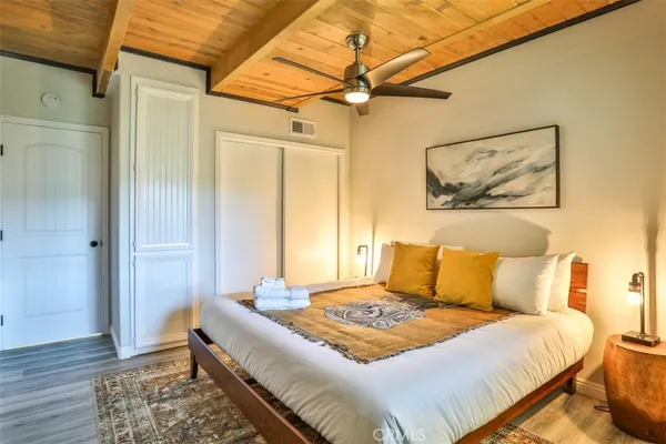 a view of front door with wooden floor