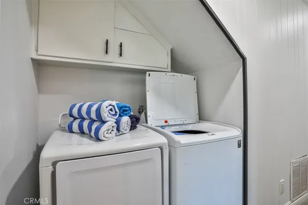 a view of a city with mountains in the background