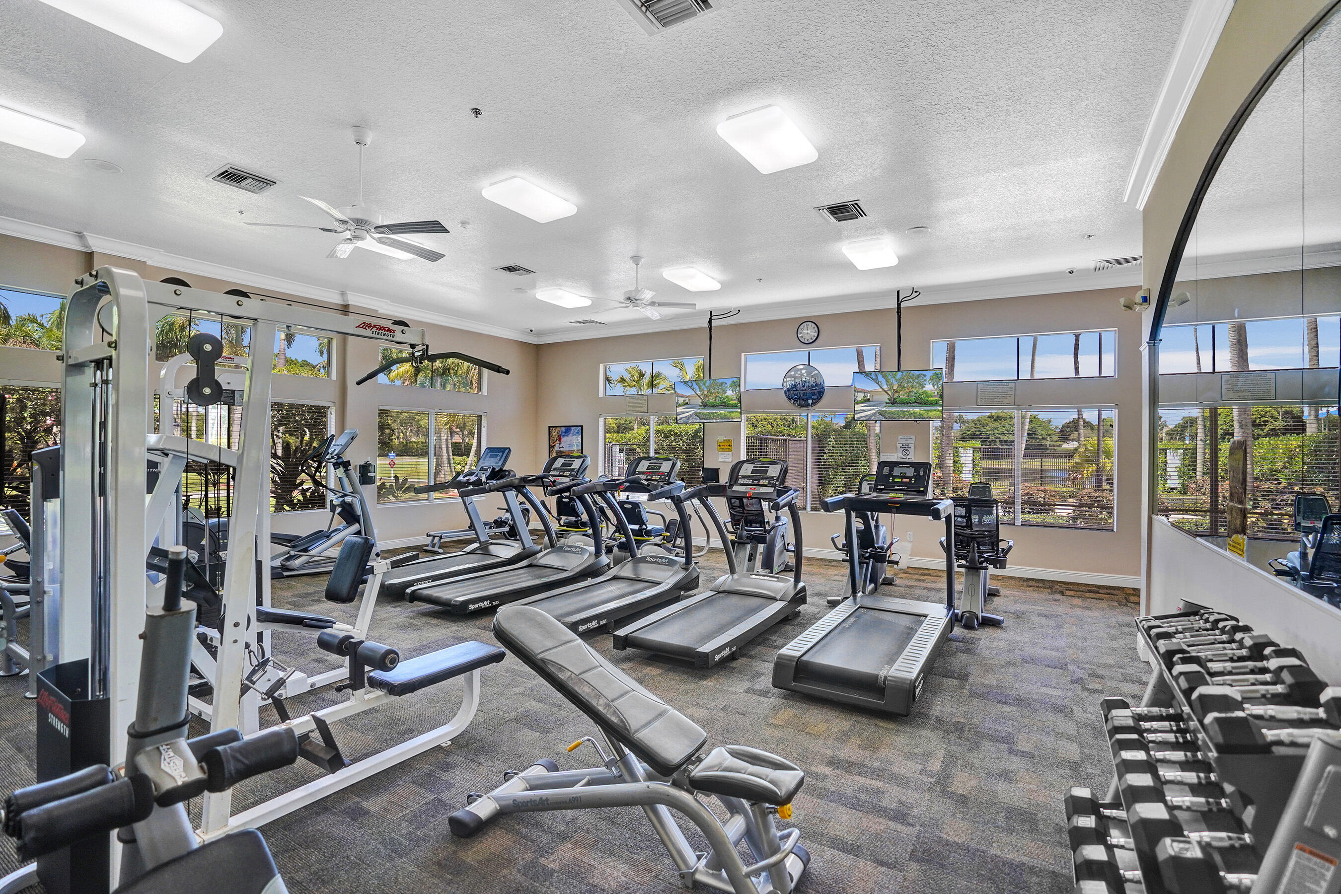 15874 Vivanco Street Delray Beach, FL 33446 - Photo 30 of 33 a view of a room with gym equipment