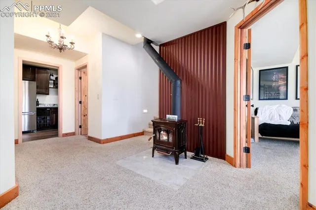 a kitchen with stainless steel appliances granite countertop a stove and a sink