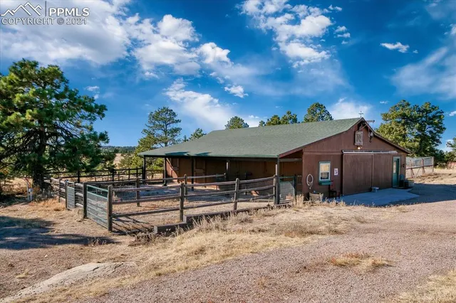 a view of a room with wooden walls