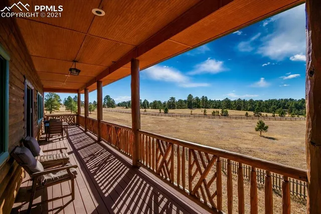 a view of swimming pool with outdoor seating
