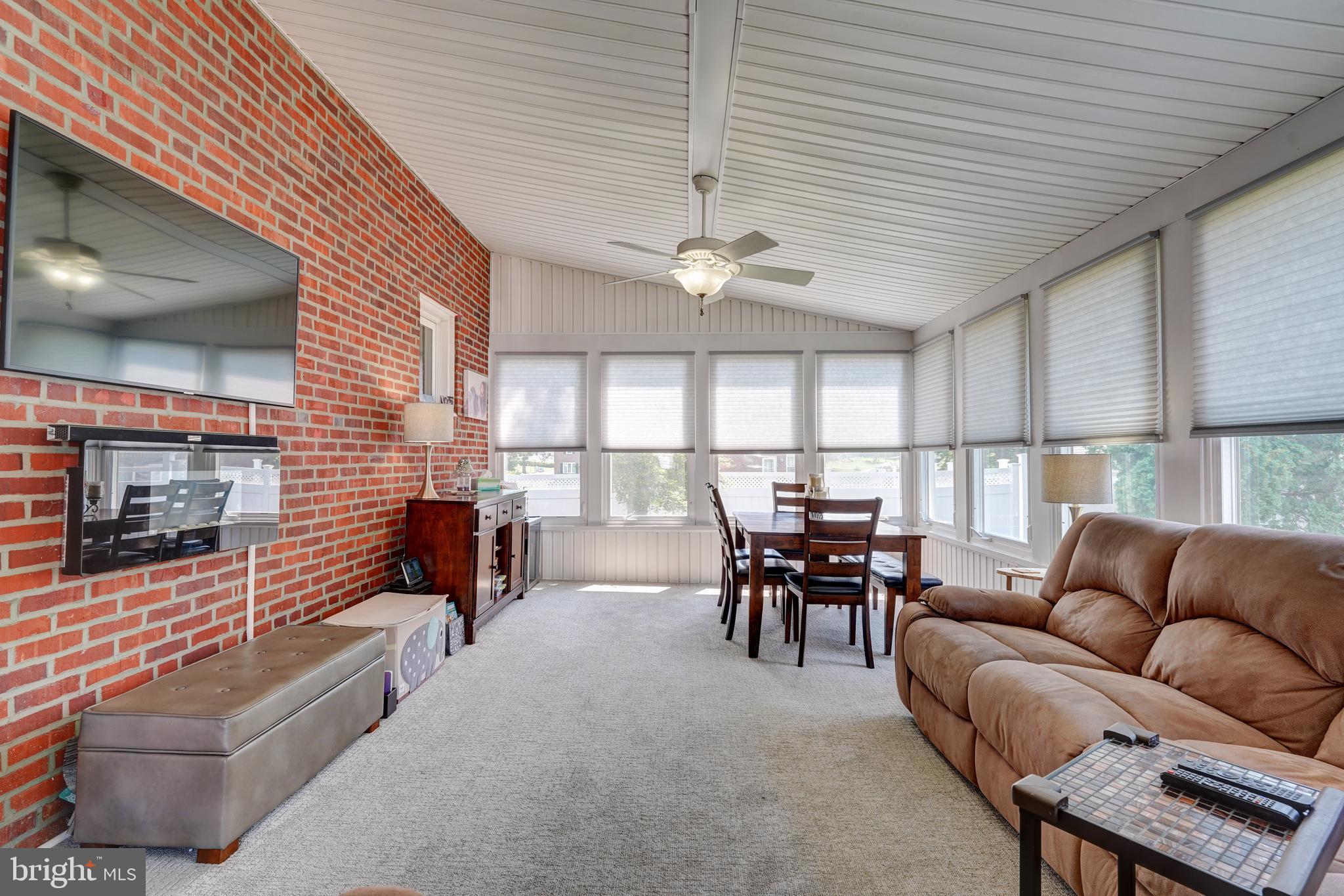 566 Scenic Road Springfield, PA 19064 - Photo 14 of 39 Family Room with exposed brick