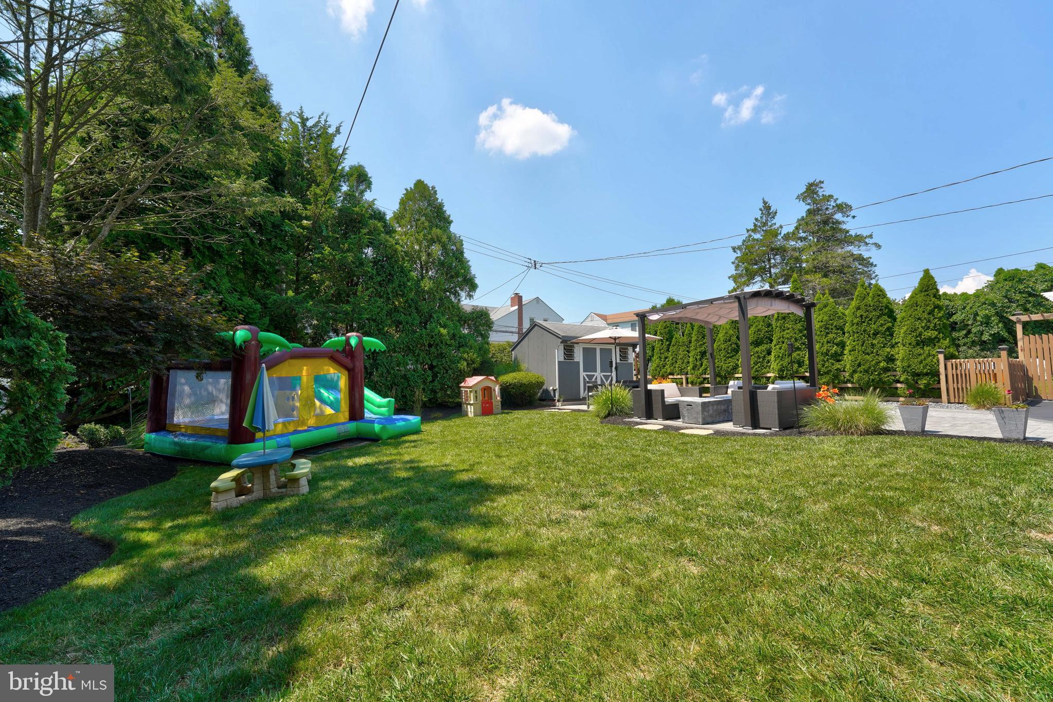 566 Scenic Road Springfield, PA 19064 - Photo 36 of 39 Large rear yard, beautiful landscaping