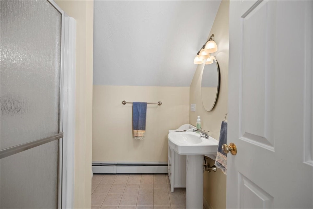185 Great Neck Road Wareham, MA 02571 - Photo 23 of 34 a bathroom with a sink and a mirror