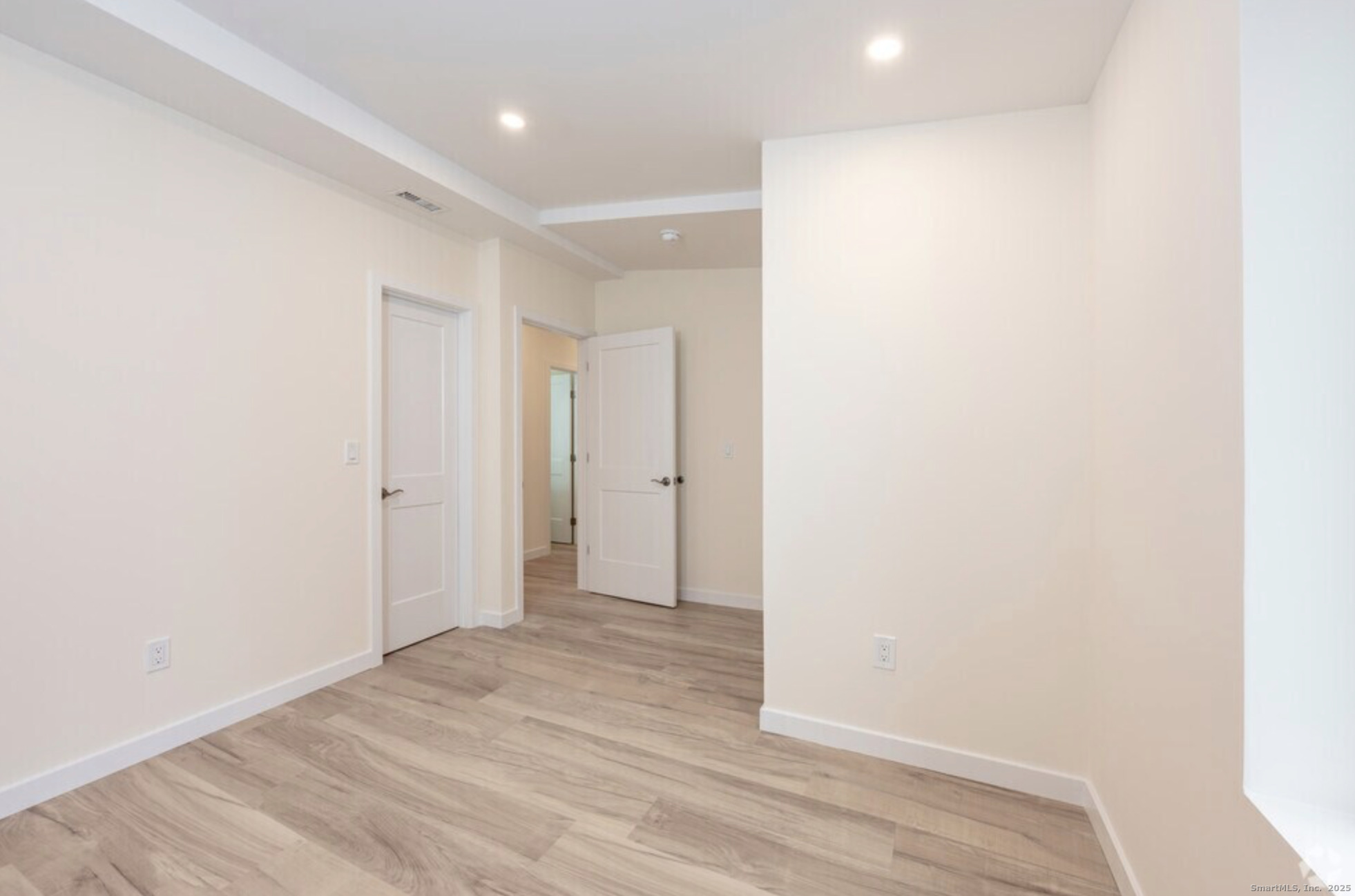 141 Bridge Street, Unit A Middletown, CT 06457 - Photo 5 of 10 a view of hallway with wooden floor