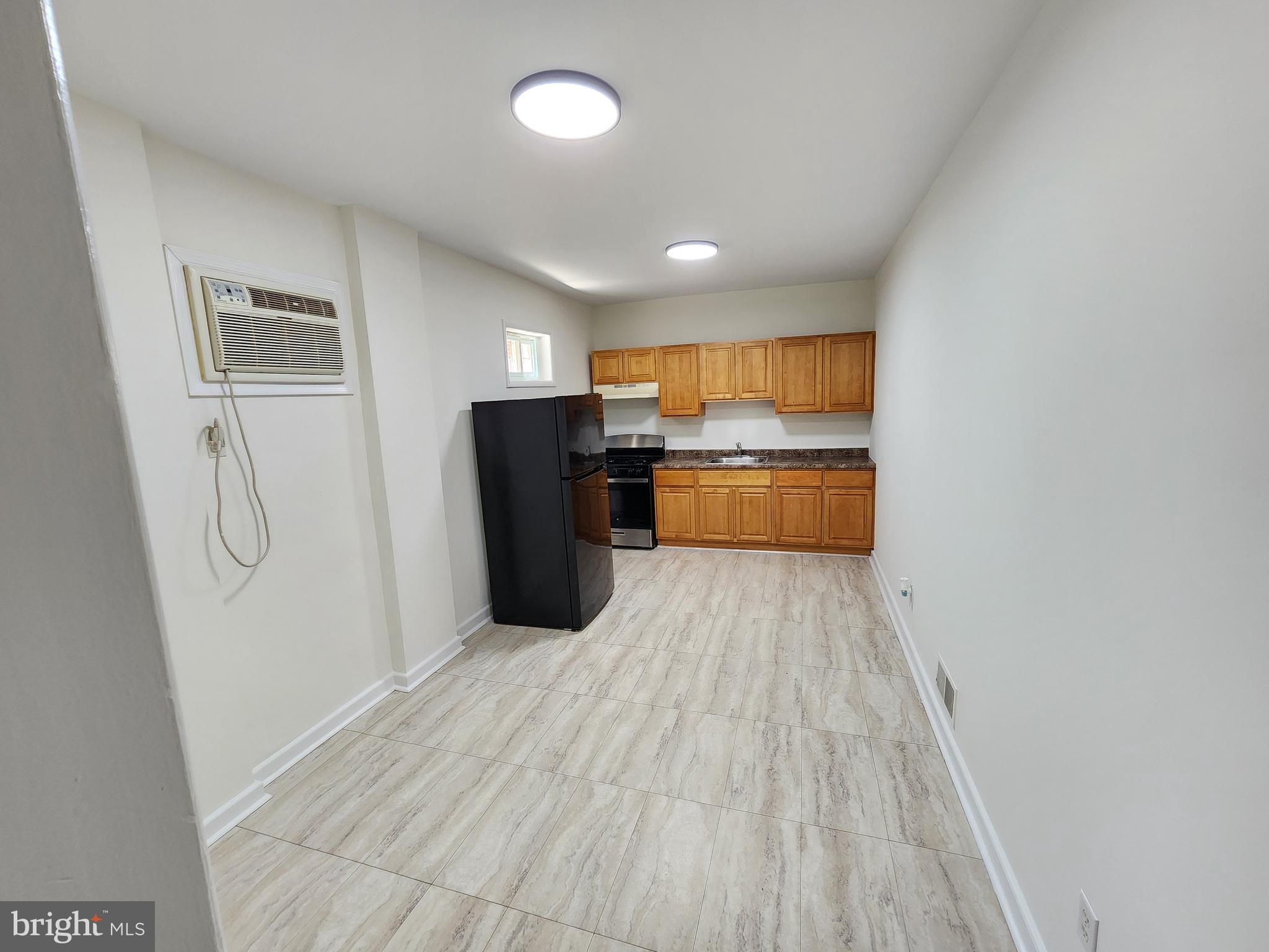 304 North 64th Street Philadelphia, PA 19139 - Photo 11 of 36 a room with storage and utility