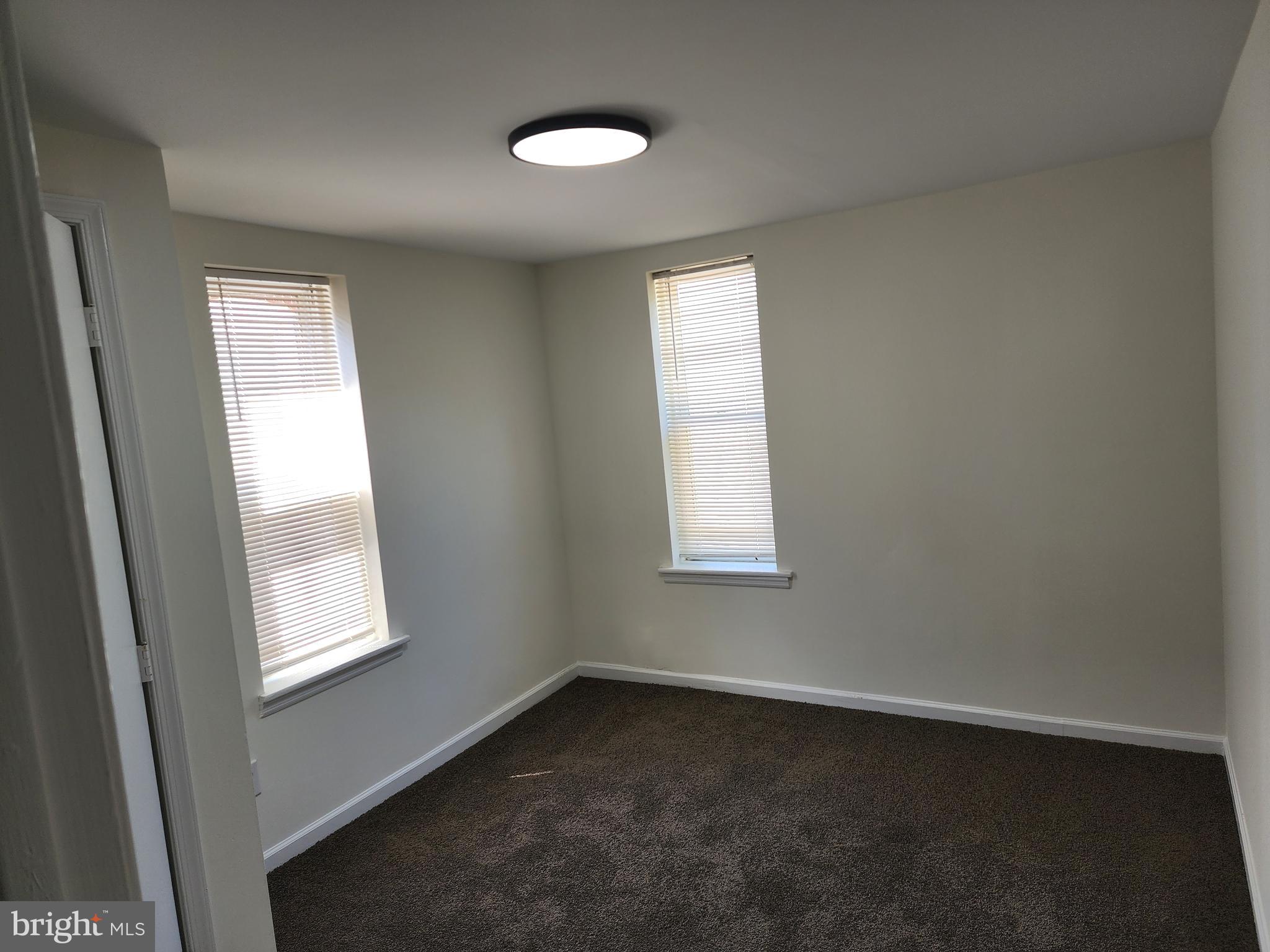 304 North 64th Street Philadelphia, PA 19139 - Photo 26 of 36 an empty room with a window