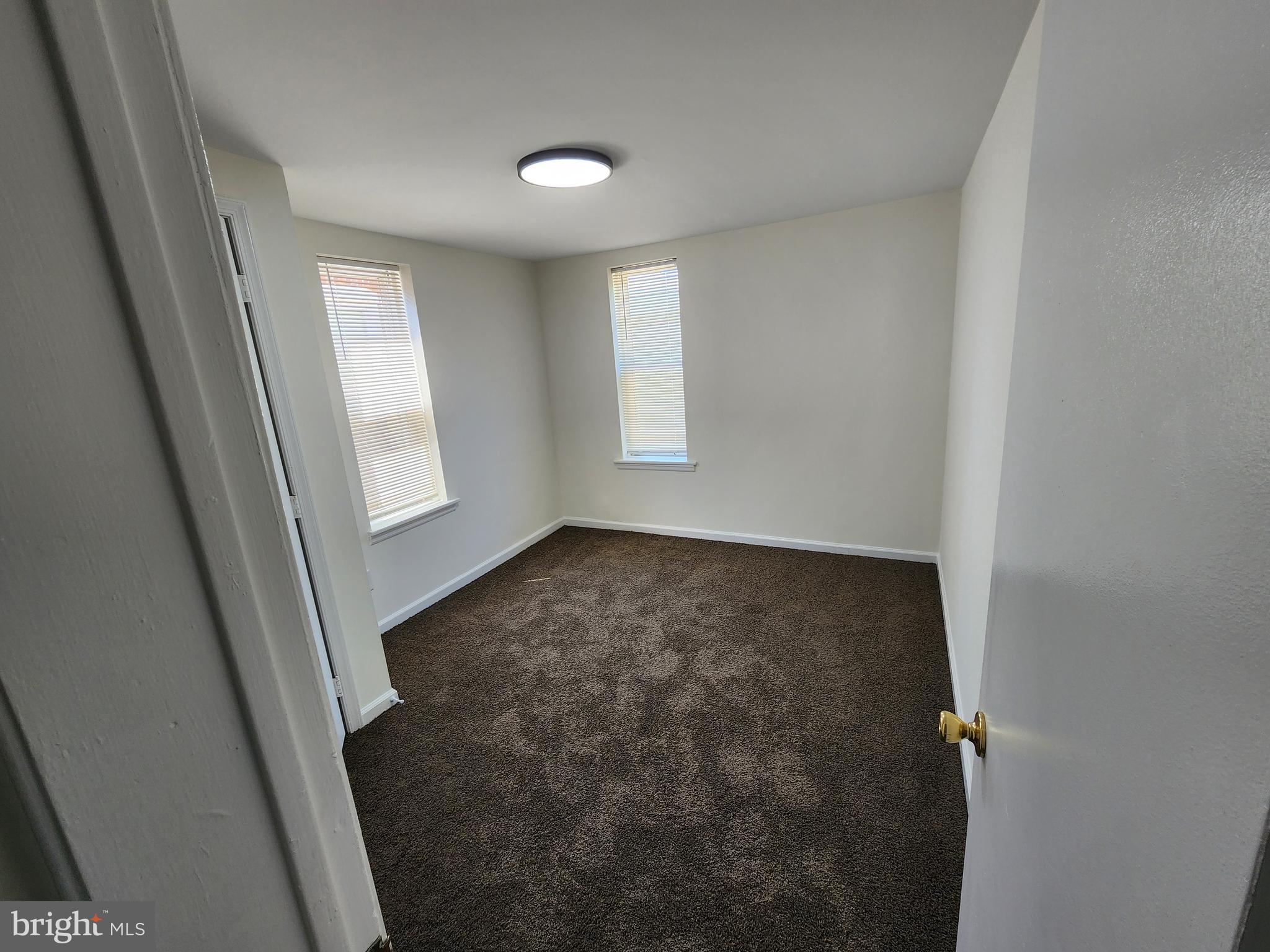304 North 64th Street Philadelphia, PA 19139 - Photo 27 of 36 an empty room with windows