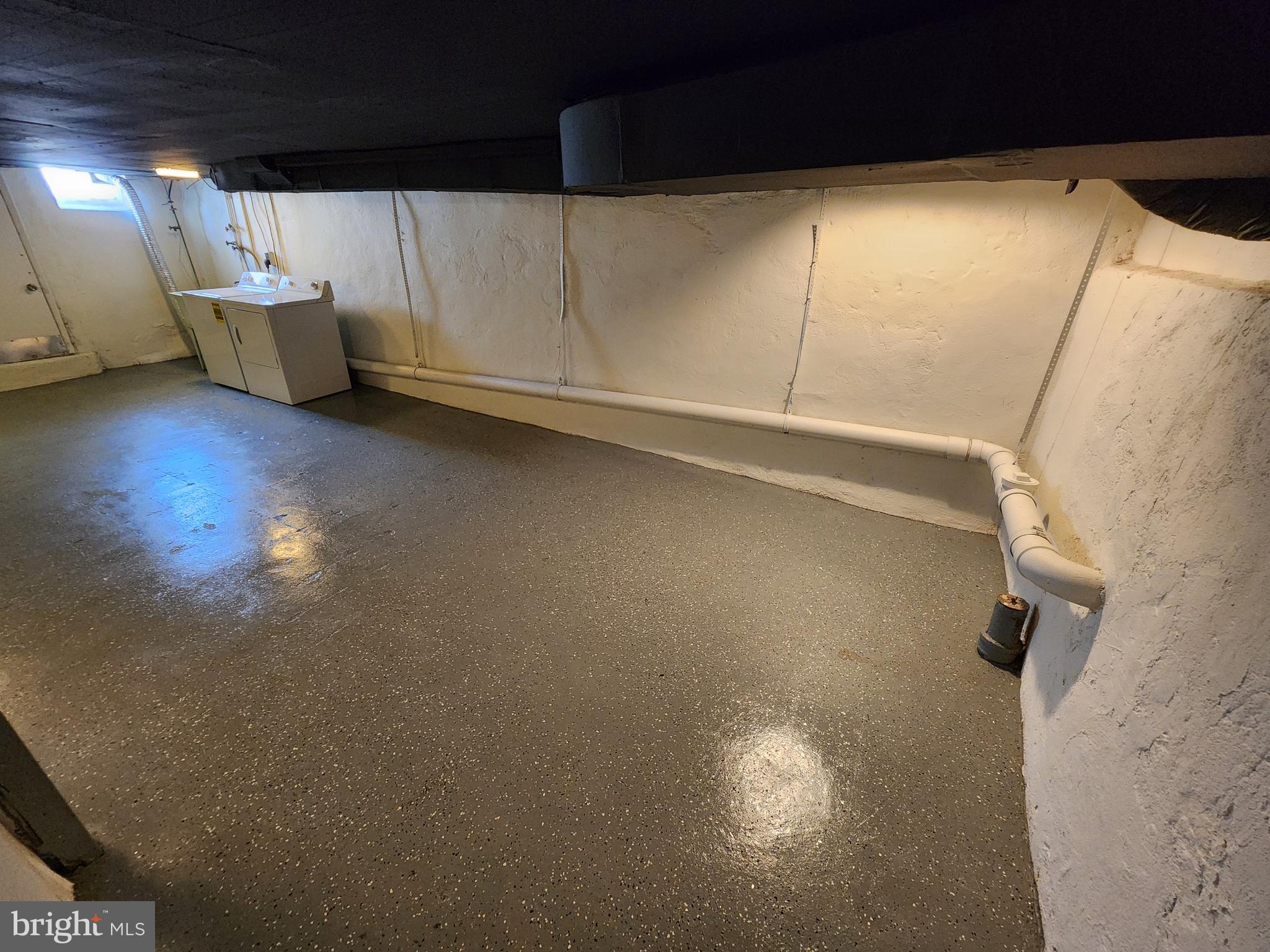304 North 64th Street Philadelphia, PA 19139 - Photo 32 of 36 a view of a room with racks on the wall