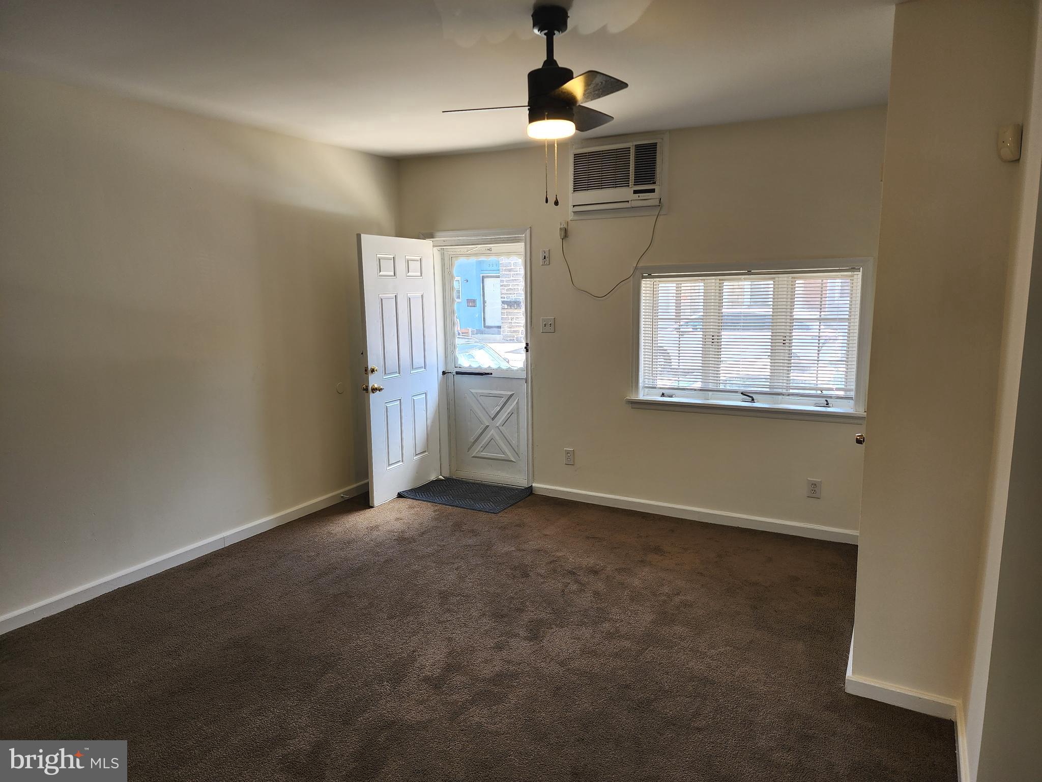 304 North 64th Street Philadelphia, PA 19139 - Photo 4 of 36 an empty room with windows