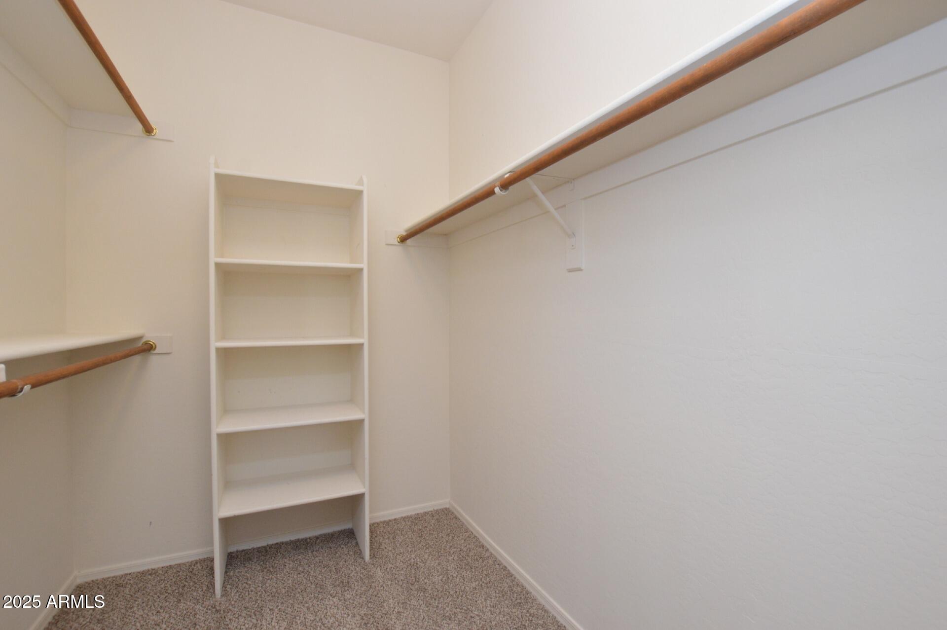 2438 West Jake Haven Phoenix, AZ 85085 - Photo 21 of 28 a view of an empty walk in closet