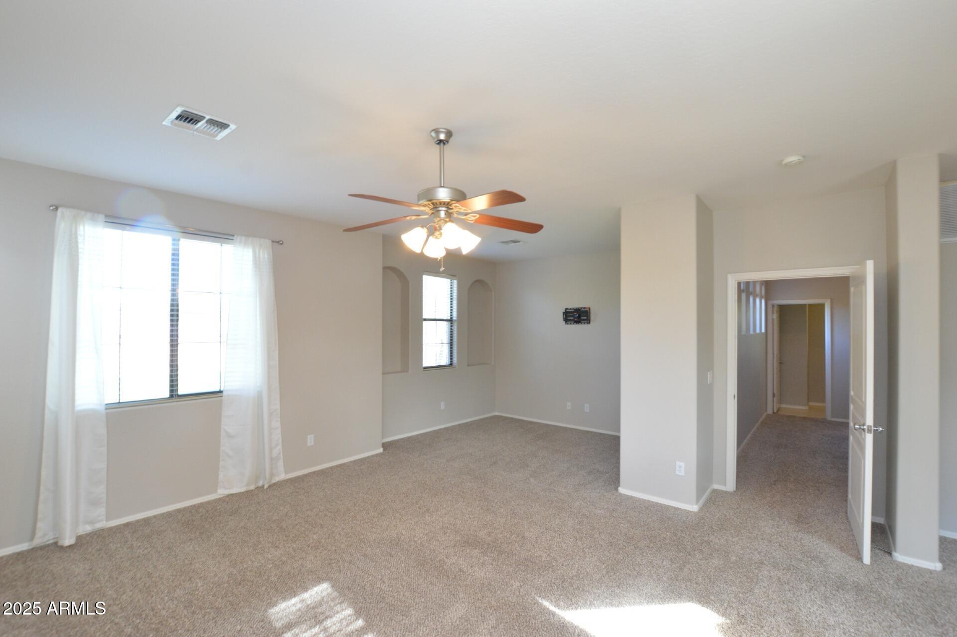 2438 West Jake Haven Phoenix, AZ 85085 - Photo 9 of 28 a view of livingroom with window
