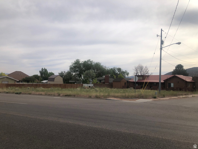 2 Canyon Road South, Unit 2 Parowan, UT 84761 - Photo 2 of 8 View of asphalt street featuring street lights, curbs, and a residential view