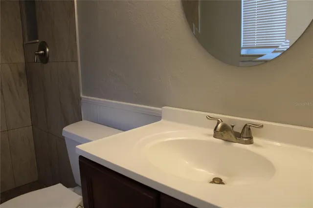 a bathroom with a sink and a bathtub