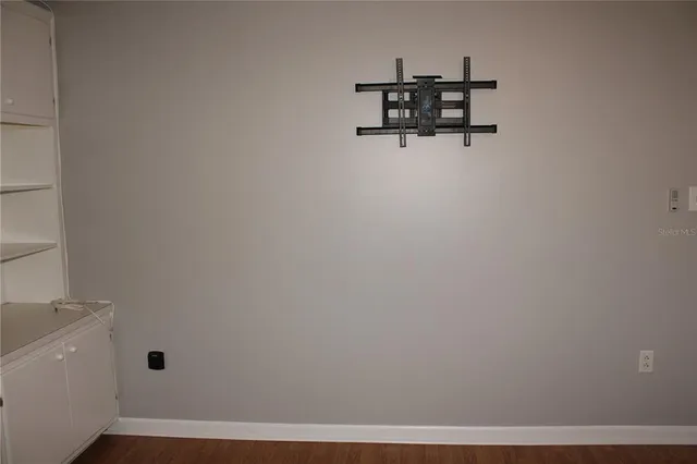 a view of cabinet with a bench