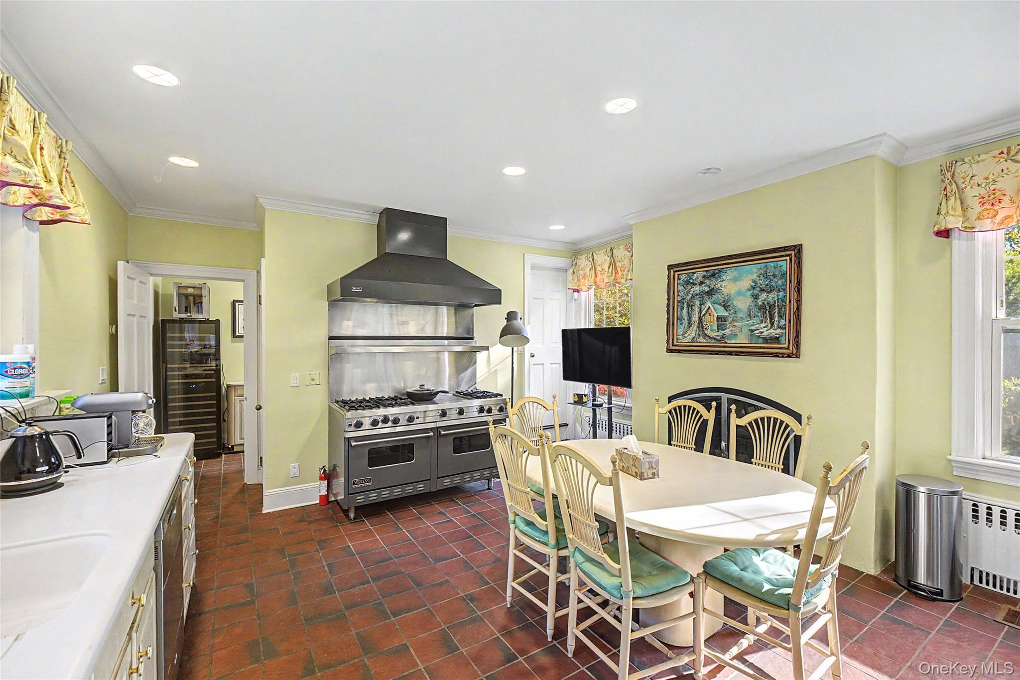 23 Townsend Road Glen Cove, NY 11542 - Photo 15 of 23 a living room with furniture a dining table and kitchen view