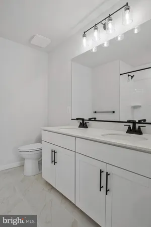 a bathroom with a shower and a bath room