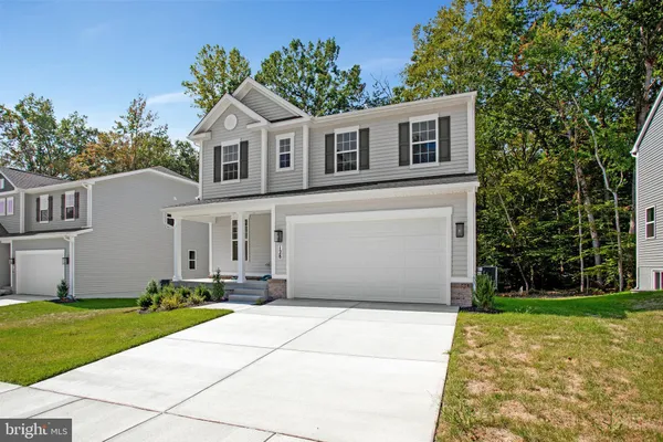 a front view of house with yard