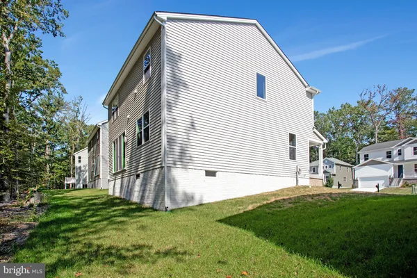 a front view of house with yard