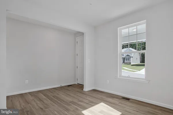 a view of an empty room and window