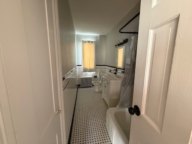 199 Purchase Street, Unit 2 Fall River, MA 02720 - Photo 8 of 9 a view of a bathroom from a corridor