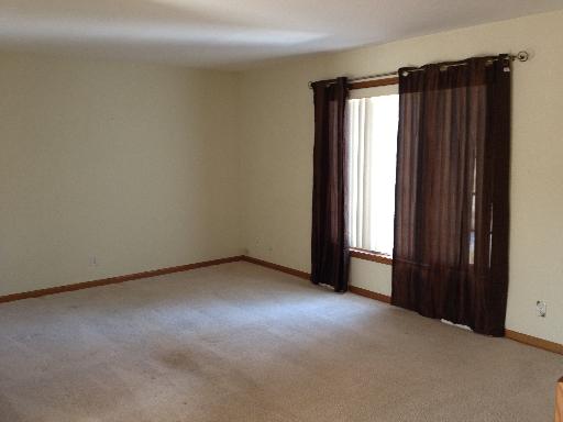 26157 West Rollins Road Ingleside, IL 60041 - Photo 2 of 10 an empty room with windows and closet