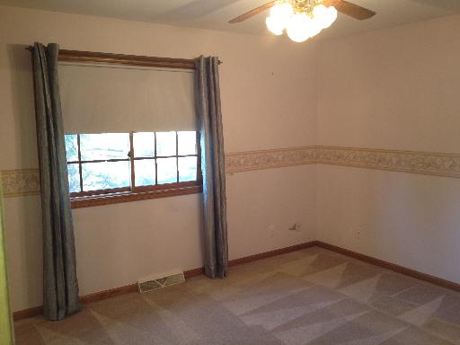 26157 West Rollins Road Ingleside, IL 60041 - Photo 7 of 10 an empty room with a window