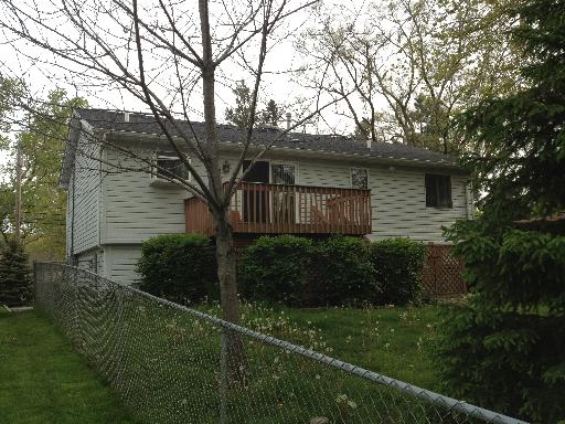 26157 West Rollins Road Ingleside, IL 60041 - Photo 9 of 10 a view of a house with a yard