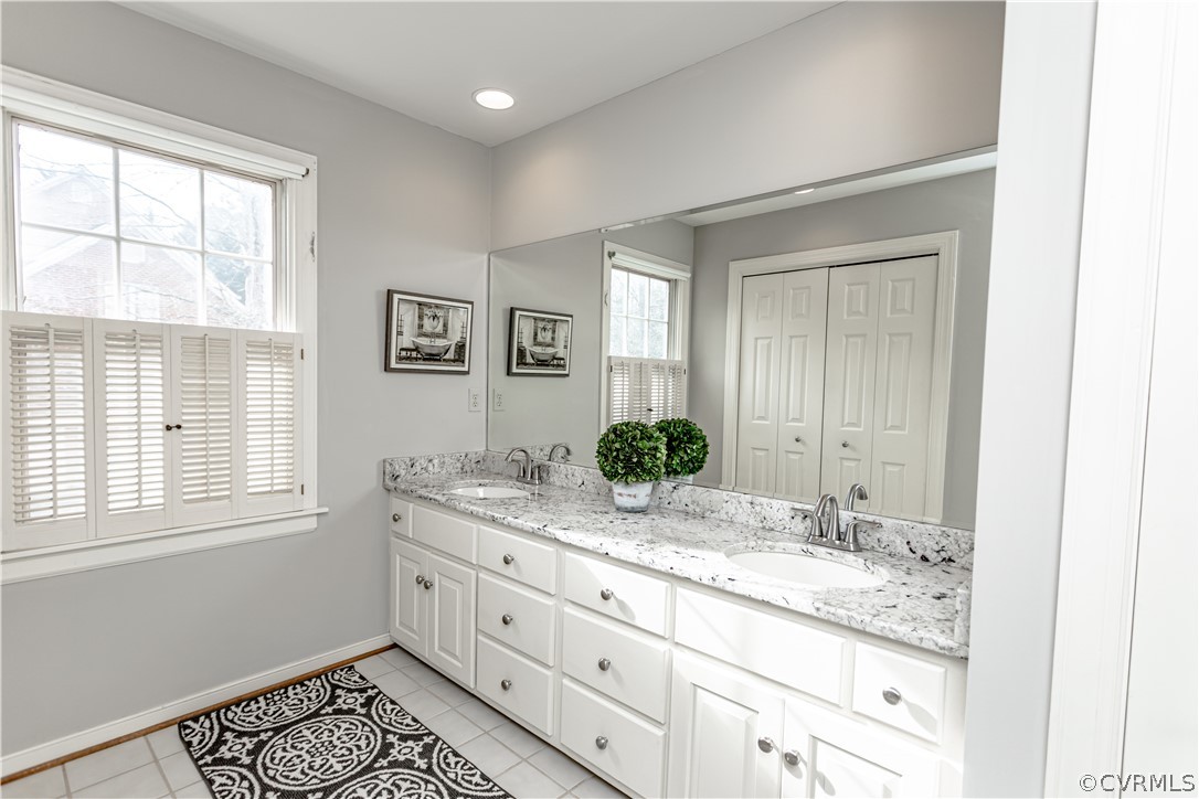 3921 Reeds Landing Circle Midlothian, VA 23113 - Photo 36 of 45 a bathroom with a granite countertop sink and a window